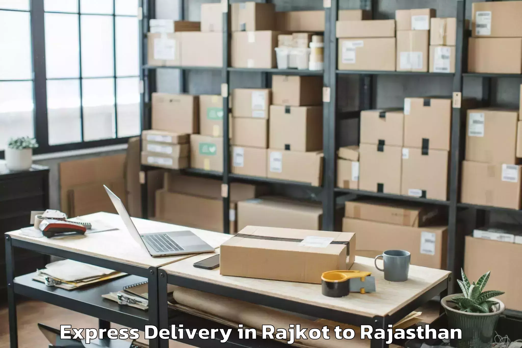 Affordable Rajkot to Reengus Express Delivery